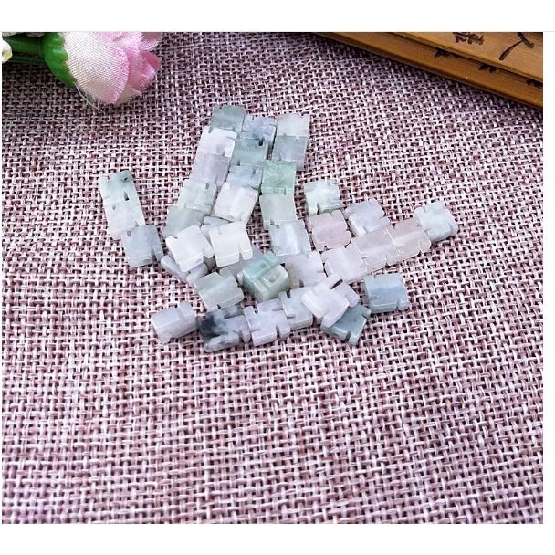 gói 1 viên charm chữ Vạn đá 4x8mm tự nhiên, lỗ xỏ 1mm làm vòng P131-23-MH 2634