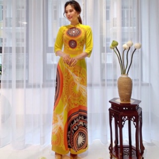 Set áo dài truyền thống in họa tiết trống đồng. Hình thật