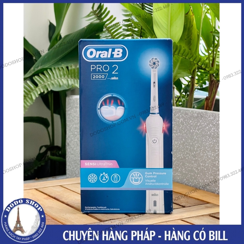 Bàn chải đánh răng điện tự động Oral B Pro 2000 trắng làm sạch răng, hạn chế viêm nướu