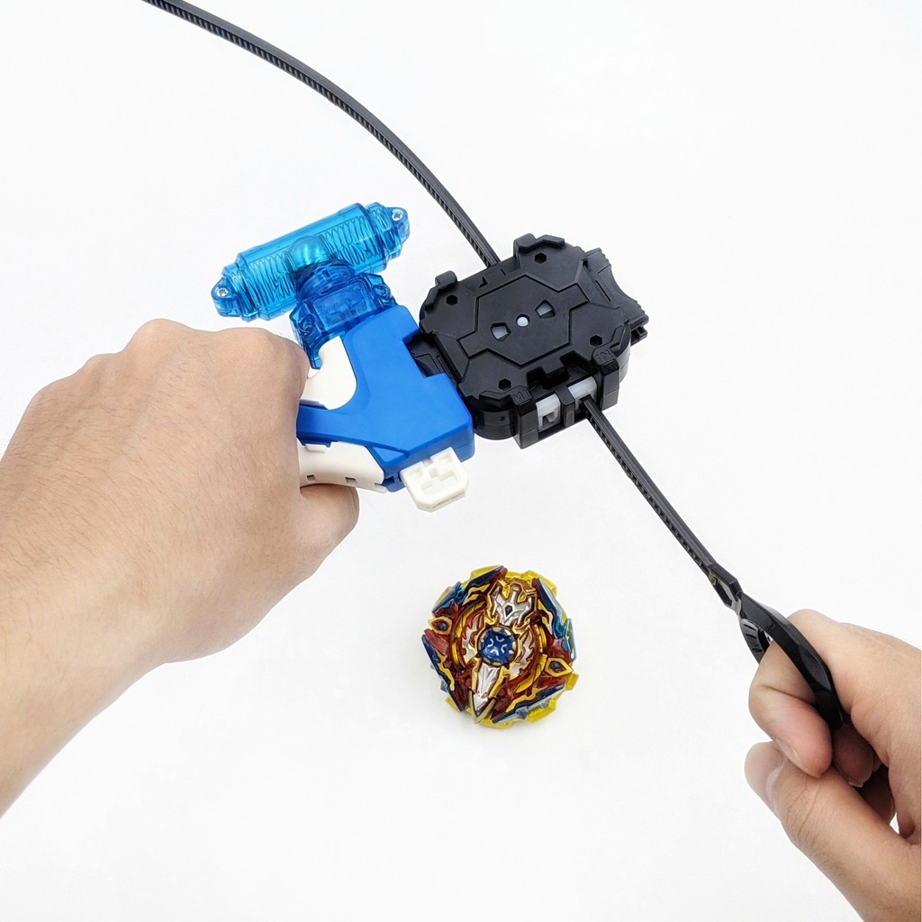 Bộ 4 Con quay BeyBlade + 3 Tay phóng + Sàn đấu - Con quay vòng xoay thần tốc
