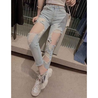 Quần jeans rách mảng lớn
