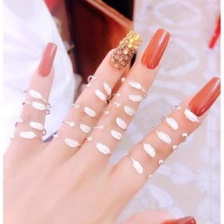 Nhẫn lông vũ bạc ta