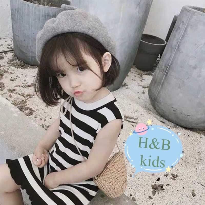 Váy kẻ nơ xoè đuôi cá bé gái