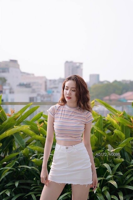 Chân váy kaki tua rua gấu
