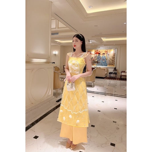 Áo dài cách tân 4 tà Ngọc Sương với hai màu trắng vàng áo dài kết đính thiết kế đi tiệc chụp ảnh mẫu mới năm 2022