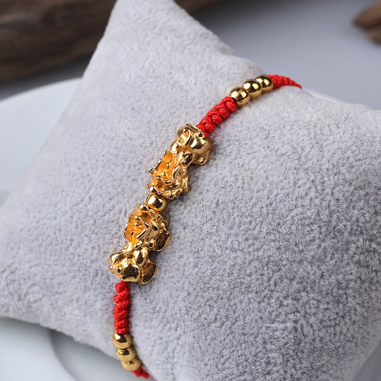 VÒNG TAY TỲ HƯU CHARM CHÂU VÀNG