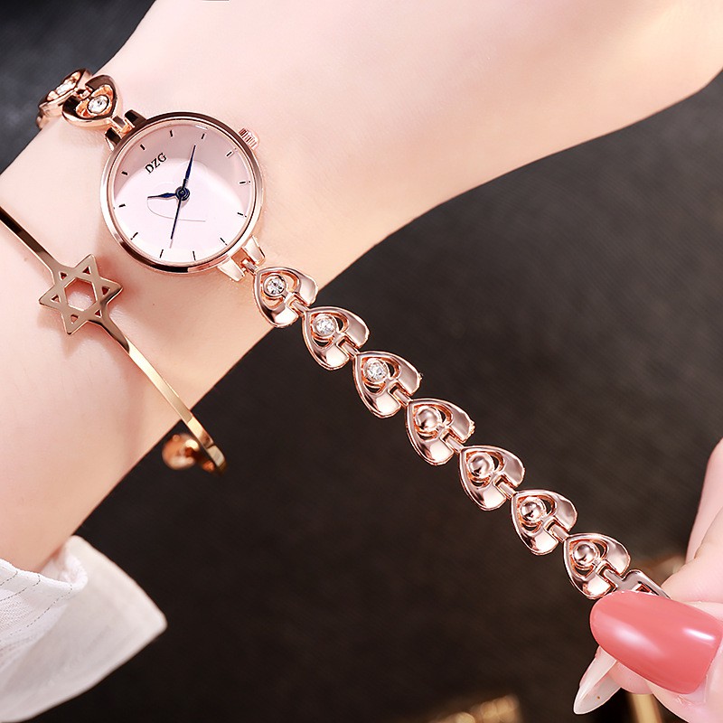 Đồng hồ thời trang nữ lắc Dzg LT07 họa tiết trái tim xinh xắn | BigBuy360 - bigbuy360.vn