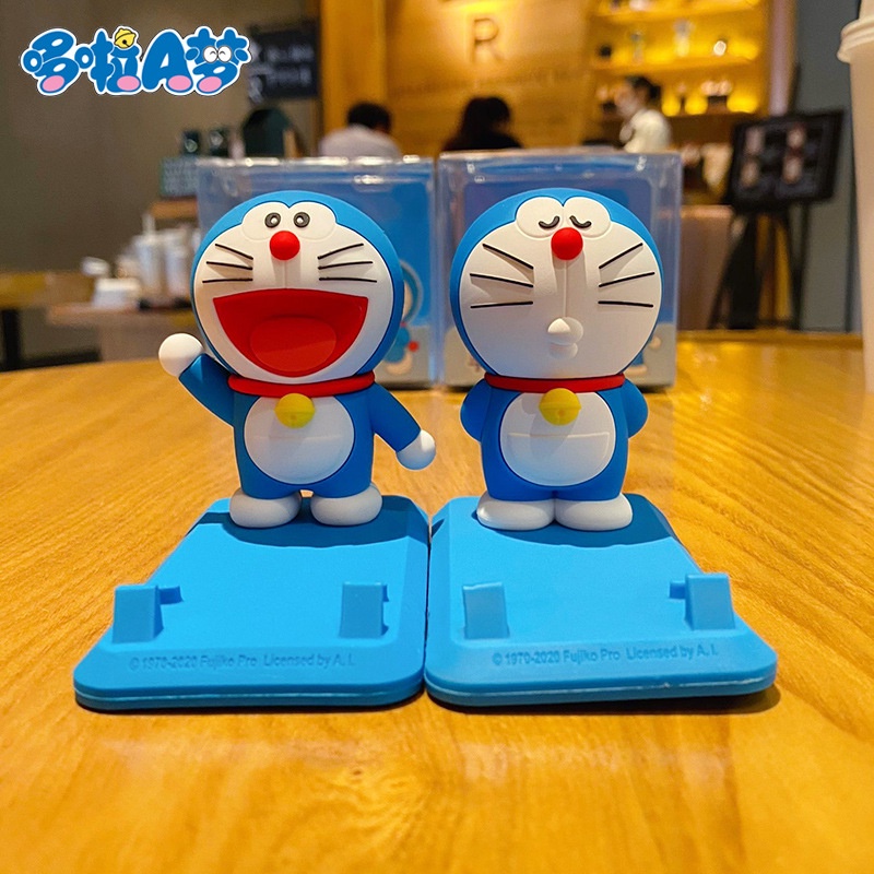 Kệ đỡ điện thoại Doraemon nhiều biểu cảm dễ thương chất liệu PVC chống xước, chống trơn trượt làm quà tặng, hàng ngày