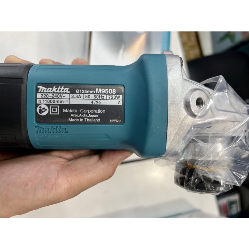 Máy mài góc cầm tay bằng điện Makita M9508B