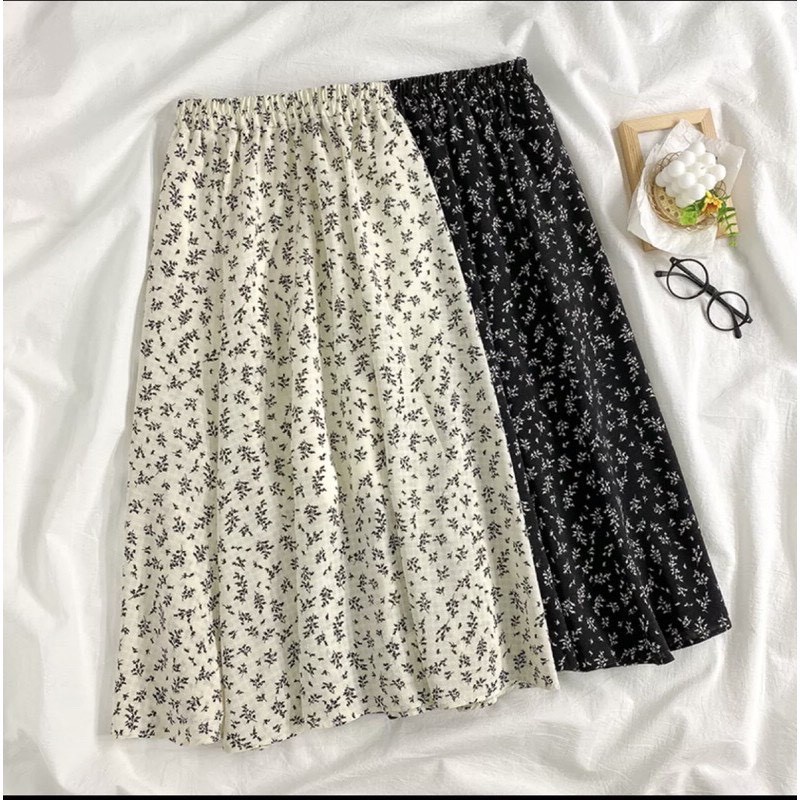 [Quà tặng là dây chun buộc tóc nữ] Chân váy midi hoa nhí 2 màu đen trắng phong cách ulzzang Lucy Outfit thiết kế | BigBuy360 - bigbuy360.vn