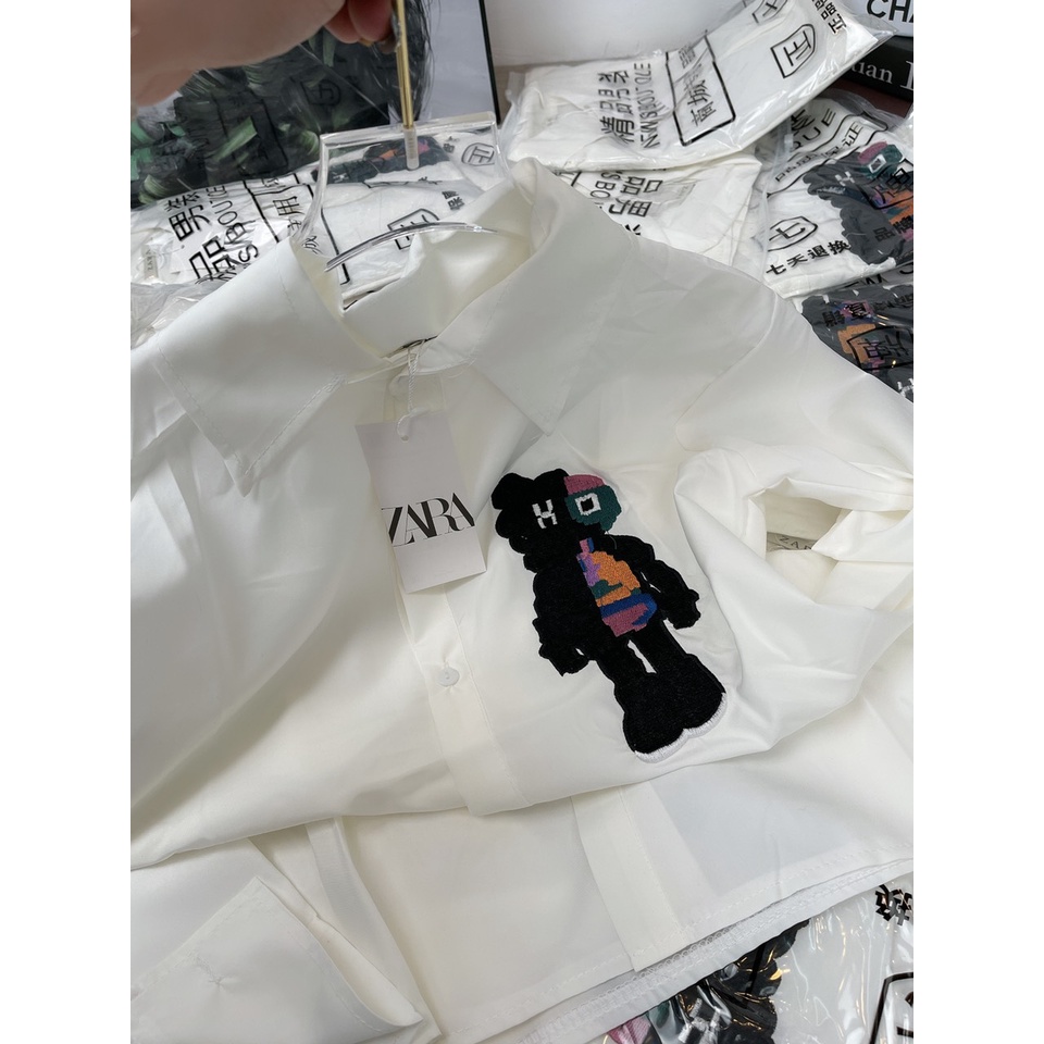 Áo sơ mi form rộng hoạt hình thêu KAWS 7 màu áo sơ mi trắng nữ TH001
