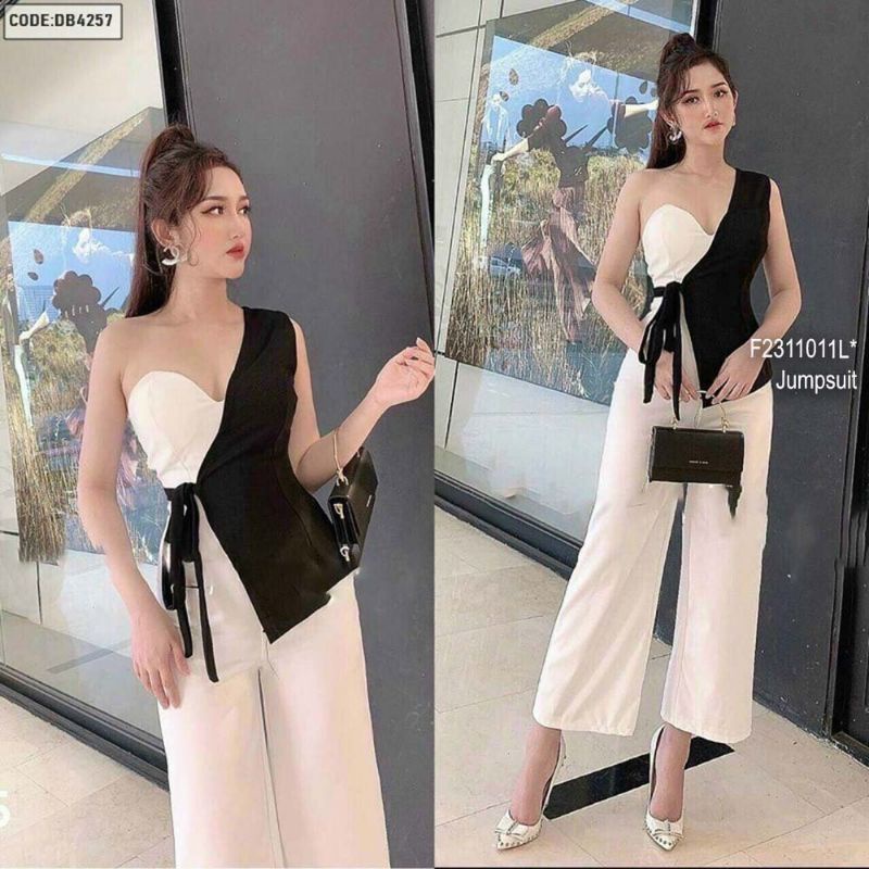 Jumpsuit umi trắng dài ống suông pha đen thắt nơ bên eo một vai 2311