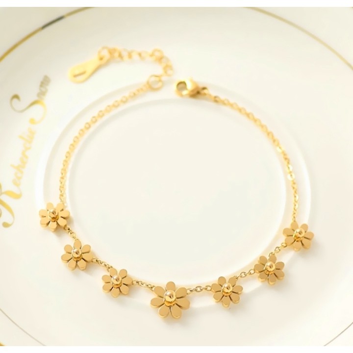 Lắc tay titan hoa cúc màu vàng tươi siêu đẹp, bền màu hợp thời trang, dễ phối đồ