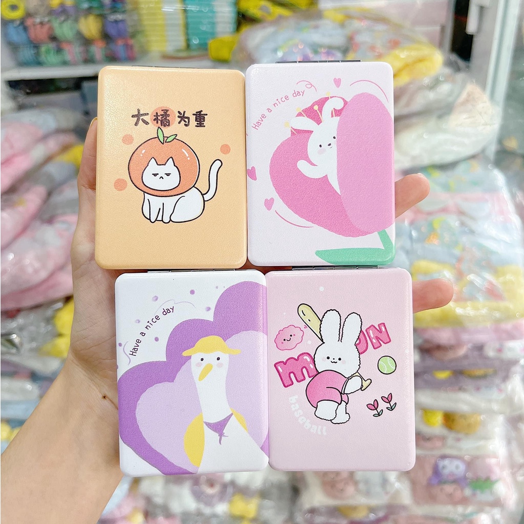 Gương trang điểm cầm tay 2 mặt mini gấp gọn tiện lợi