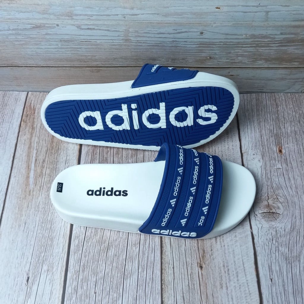 | Ảnh - Video Thật | Dép quai ngang 𝐀𝐝𝐢𝐝𝐚𝐬 dép Unisex nam nữ đế bánh mì chất liệu cao su non Dép Quai Chữ Adida