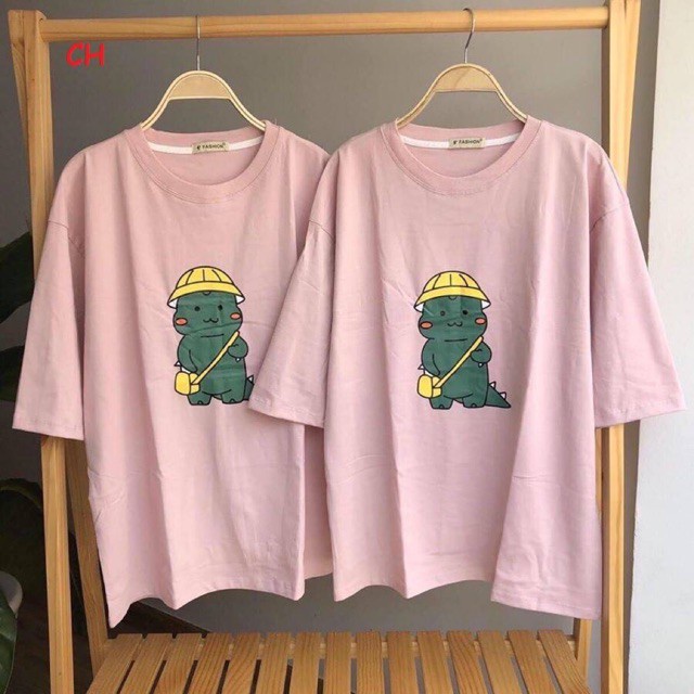 Áo phông khủng long đeo túiÁo phông thun trơn nam nữform thụng tay lỡ unisexmềm mịn freesizeco giãn 4 chiều