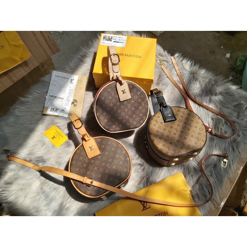 Túi quai xách tròn khoá bấm