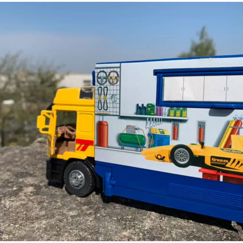 Xe tải mô hình chở xe đua f1 hợp kim 1:40