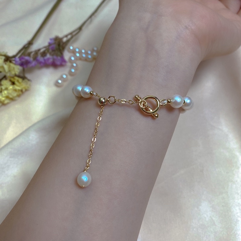 Vòng tay hạt tròn đều màu trắng ánh hồng 8ly