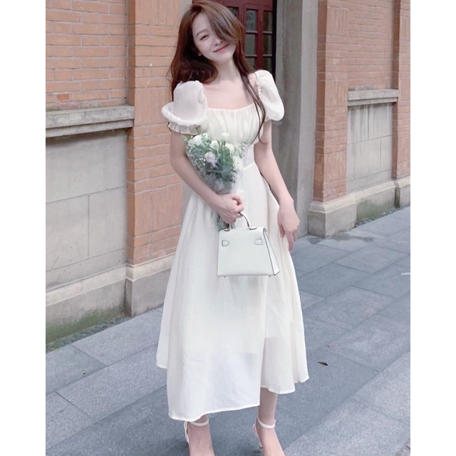 Đầm trắng xoè đi tiệc nhúng ngực nơ sau thun vai xuongvnxk