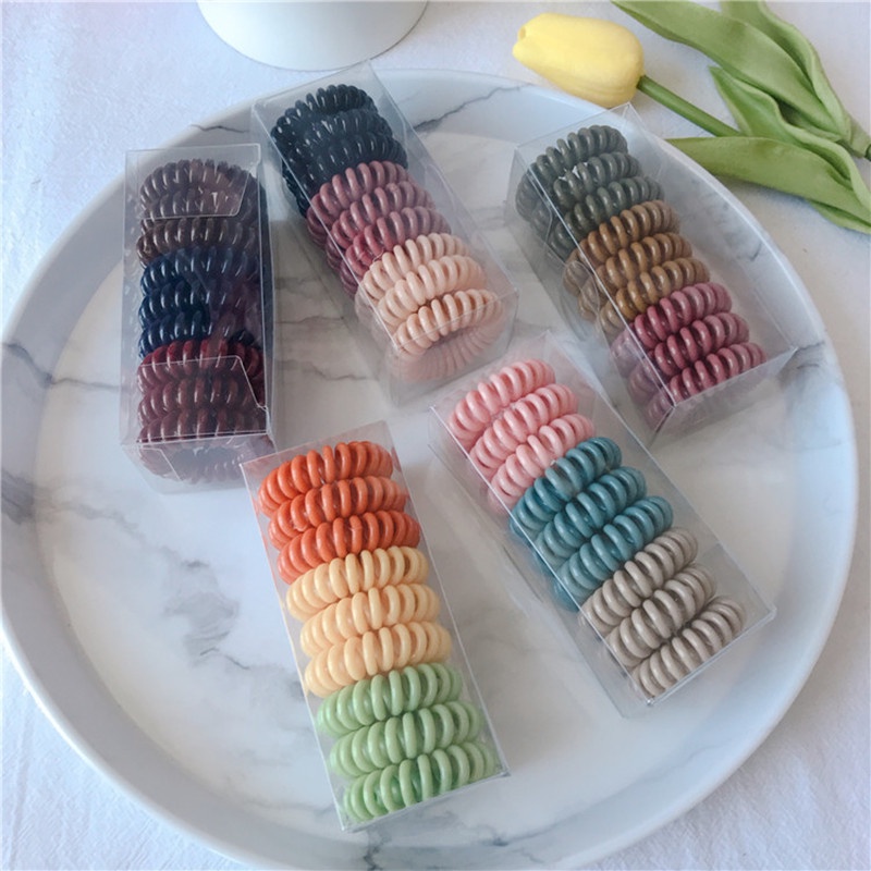 Hộp 9 dây buộc tóc lò xo cao cấp mix sẳn màu cho nữ, siêu tiện lợi