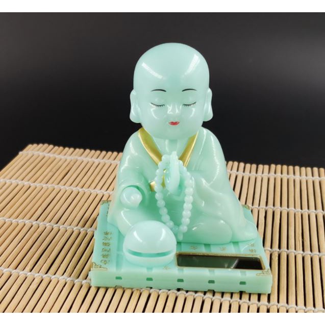 TƯỢNG PHẬT GÕ MỎ TỤNG KINH BẰNG NGỌC