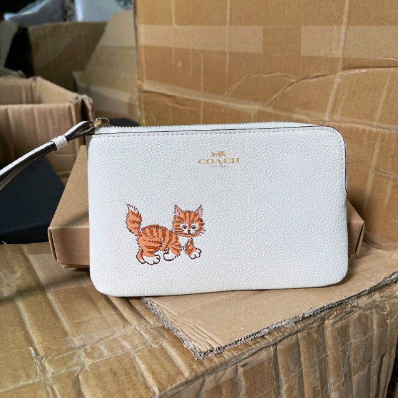 Ví coach đeo cổ tay siêu cưng