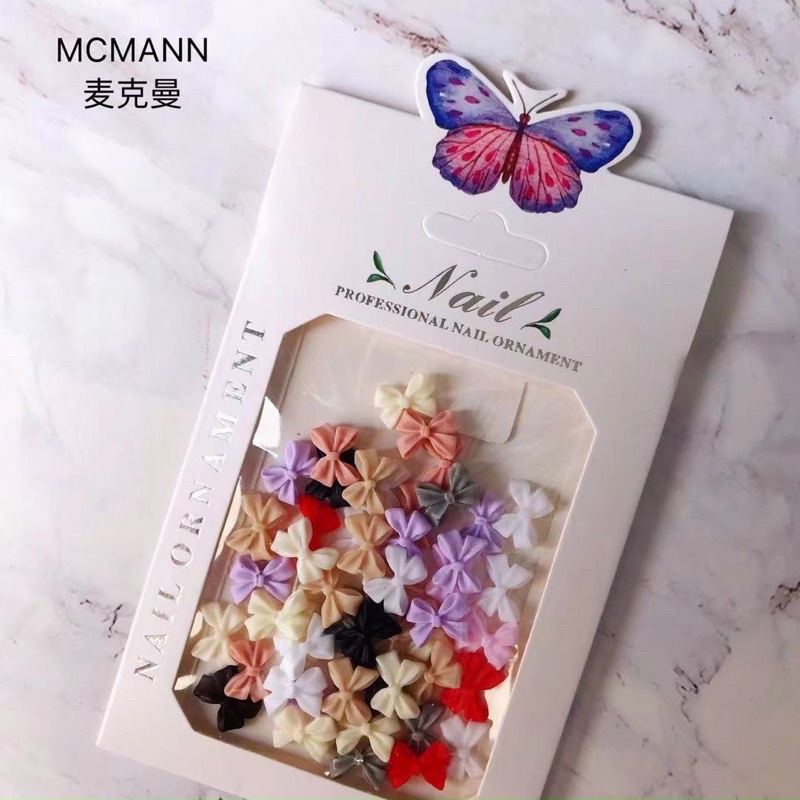 Nơ Nhựa Gắn Móng-Nail