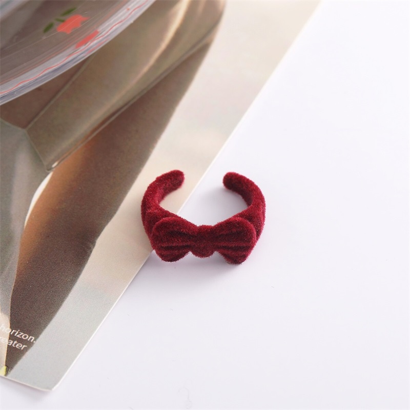 Nhẫn hở thắt nơ phong cách thu đông thời trang mới