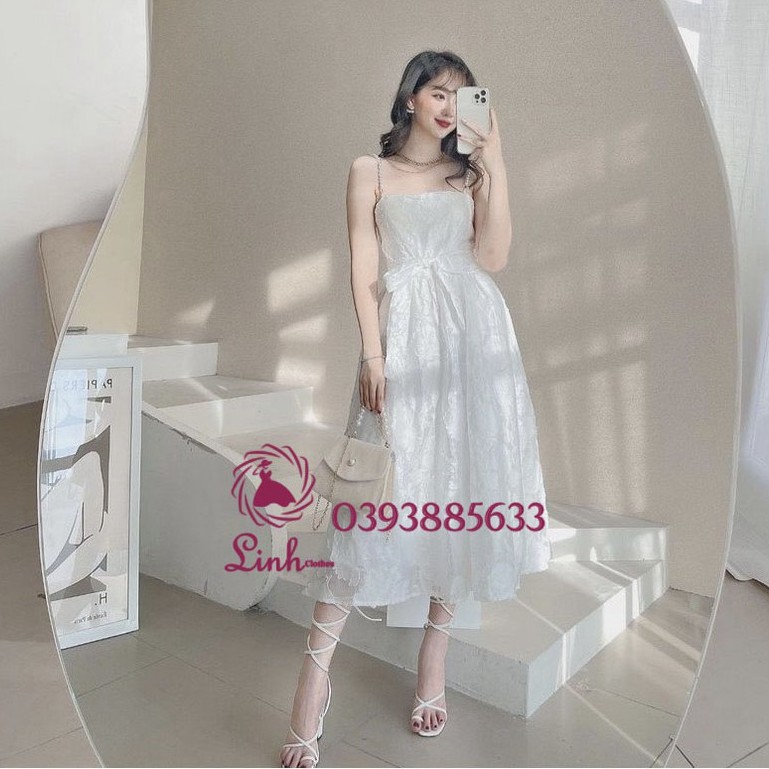 Đầm tiểu thư trắng gấm nơ hai dây vai đính hạt