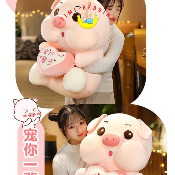 Gấu bông lợn hồng ôm trái tim cute, ngộ nghĩnh đáng yêu – Gấu bông hình con heo - Timibedding