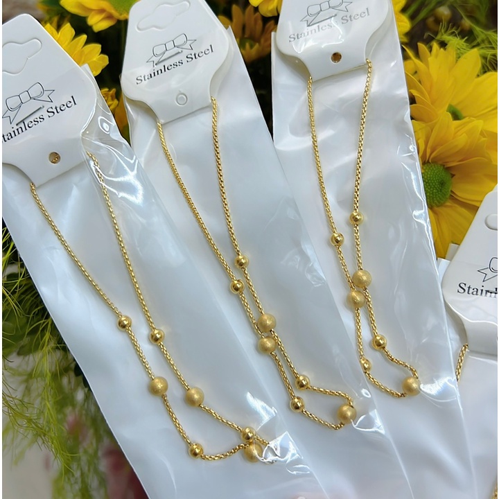 Lắc tay nữ cao cấp titan kiểu bi dây rút màu vàng siêu đẹp, bền màu, sang trọng, quý phái