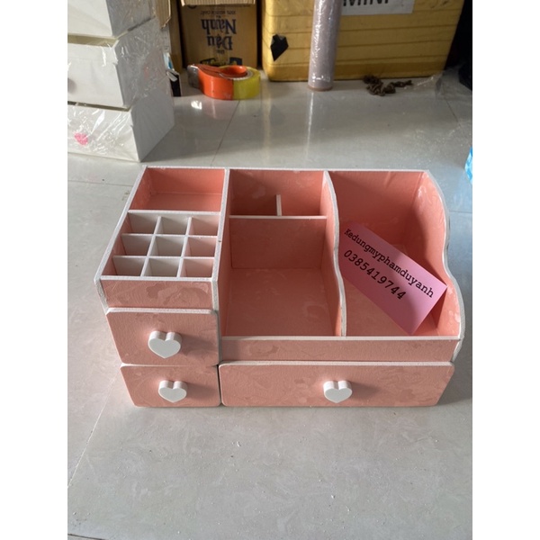 Kệ mỹ phẩm max hồng 35cm 9 ô son trên