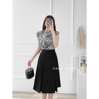 Chân váy xòe xếp li dáng lửng công sở