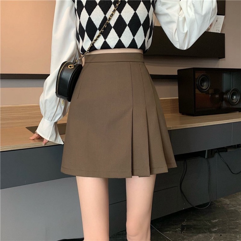 Chân váy ngắn chữ A xếp ly lệch tà có quần trong 2 màu đen nâu dáng lưng cao công sở nữ  xẻ tà trẻ trung ,năng động