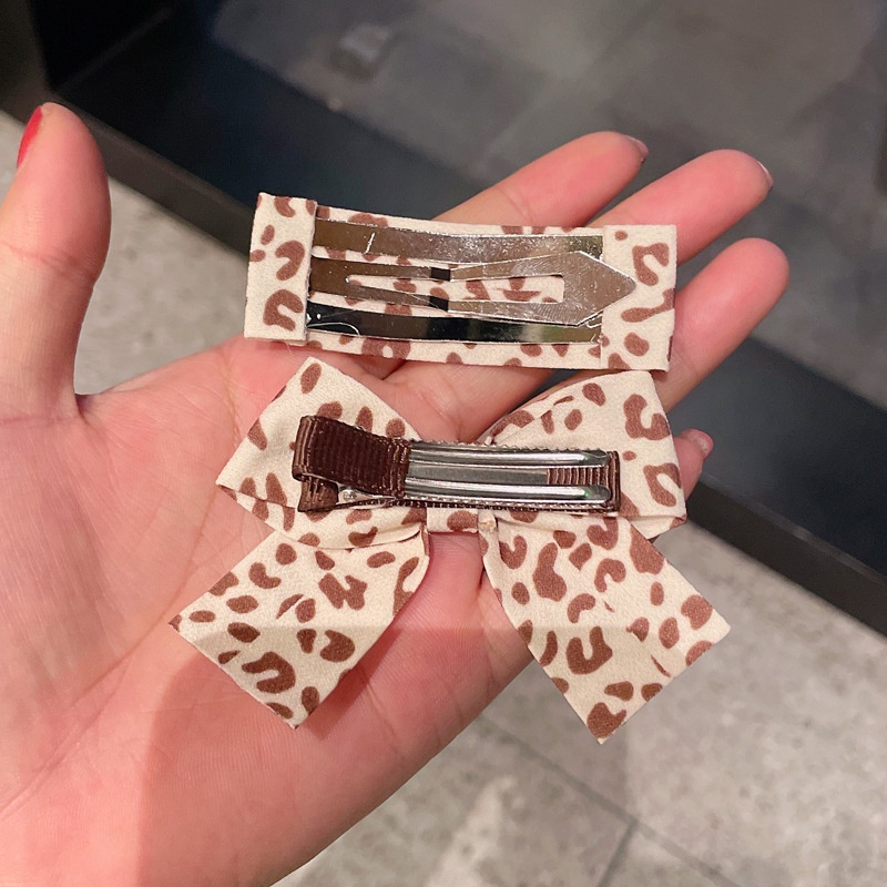 Kẹp tóc hình nơ họa tiết da báo phong cách retro dành cho nữ
