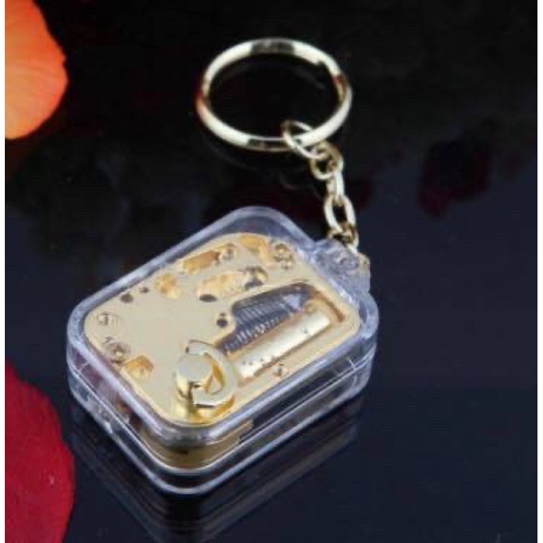 Móc khoá hộp nhạc mica trong suốt