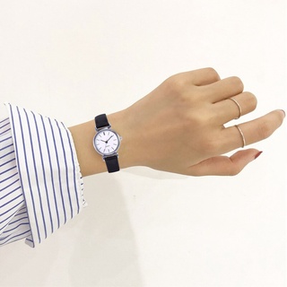 Đồng hồ thạch anh mặt tròn dây da cho nữ