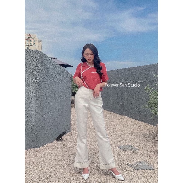 Quần trắng đột chỉ nâu