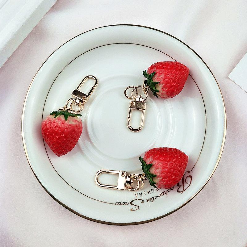 Móc Khóa Mềm Mại Hình Quả Dâu Tây Kiểm Soát Lượng Nhẹ Sáng Tạo Dễ Thương