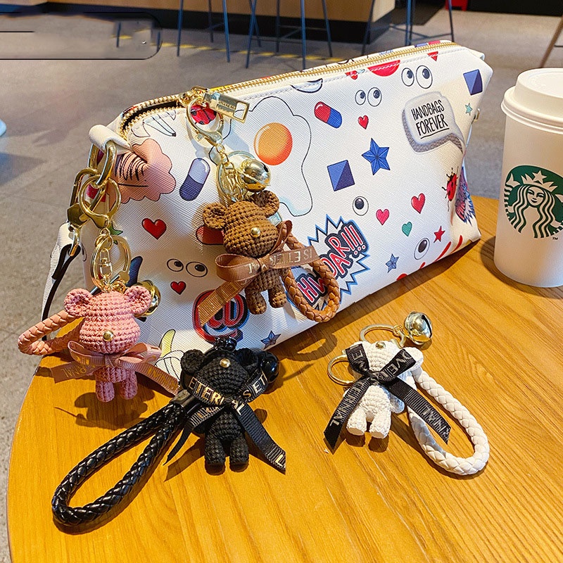 Móc khóa Bearbrick đeo nơ chất liệu PVC dây da nhiều màu sắc dễ thương trang trí balo túi xách, quà tặng bạn bè-Ráp