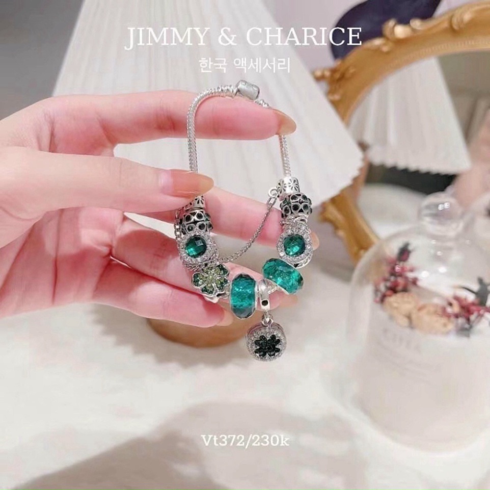 Vòng tay charm Jimmy & Charice  may mắn chất liệu titan mạ bạc không han rỉ bay tiếp xúc nước thoải mái