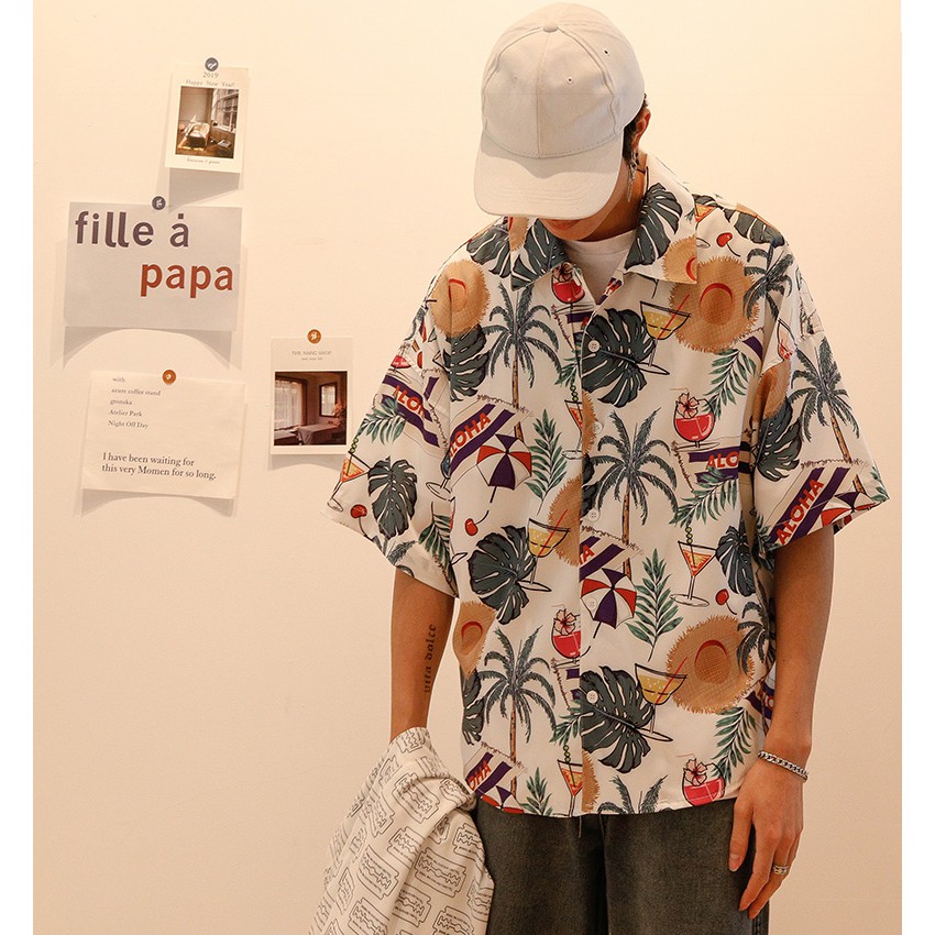Spot new men and women couples wild personality Hawaii seaside holiday loose trend fashion short-sleeved flower shirt