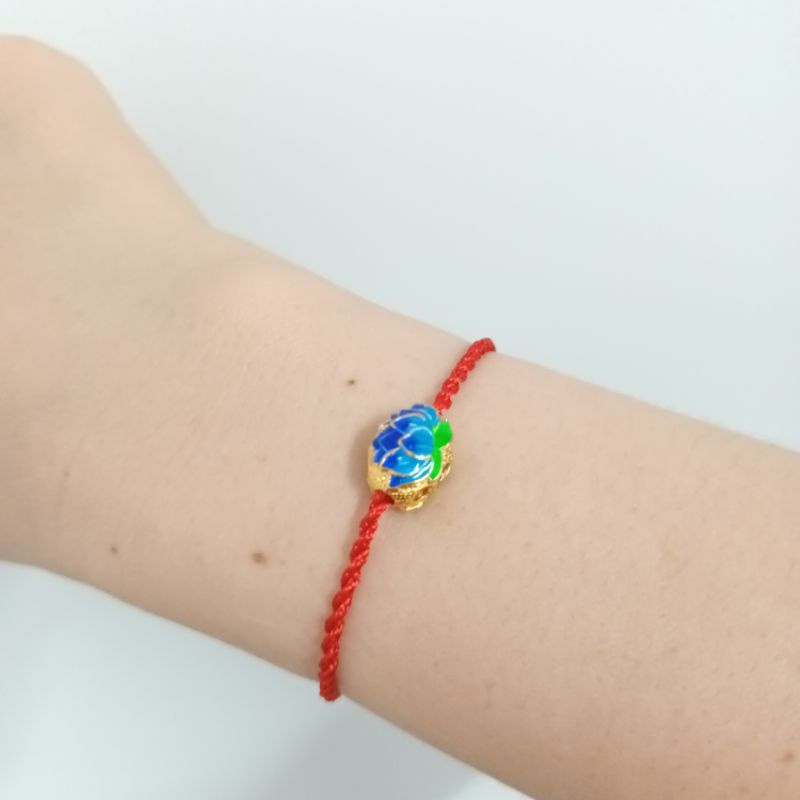 Vòng chỉ đỏ bông sen nepal xanh ngọc quyền năng bình an may mắn