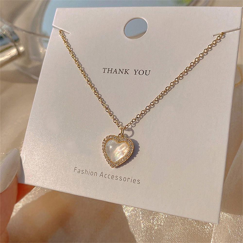 Vòng cổ Mặt Trái Tim Phối Hoa Hồng Thời Trang Cho Nữ