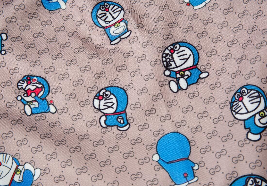 Quần Short Đi Biển Vải Cotton In Hình Doraemon Dễ Thương Cho Nam + Nữ