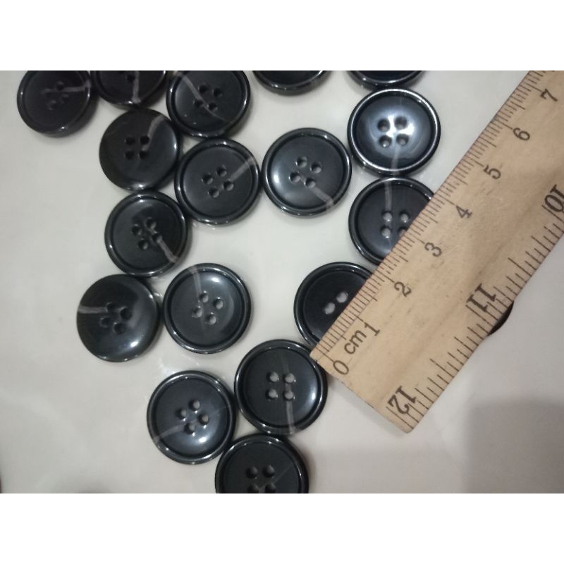 Cúc nhựa size 1.8cm.