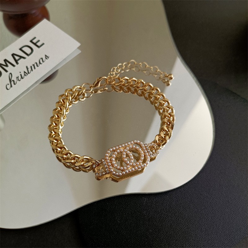 [Mã FAMARAL2 giảm 10K đơn 50K]Vòng tay nữ Chanel ngọc trai nhân tạo xích vàng nữ TB331