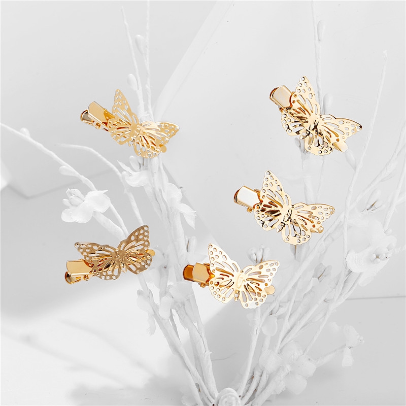 Kẹp tóc thời trang cổ điển hình con bướm màu vàng rỗng