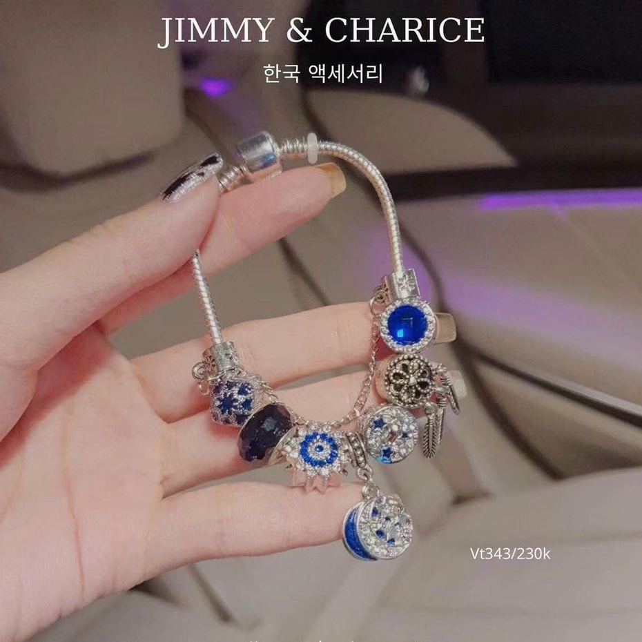 Vòng tay charm Jimmy & Charice  may mắn chất liệu titan mạ bạc không han rỉ bay tiếp xúc nước thoải mái